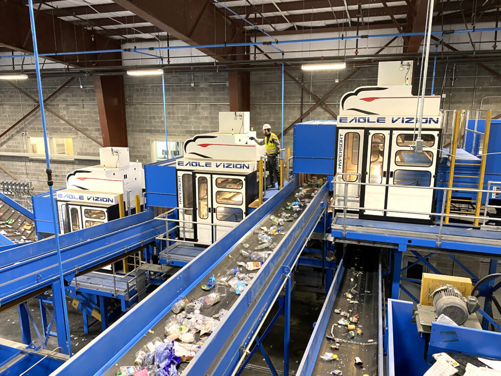 white and blue recycling equipments